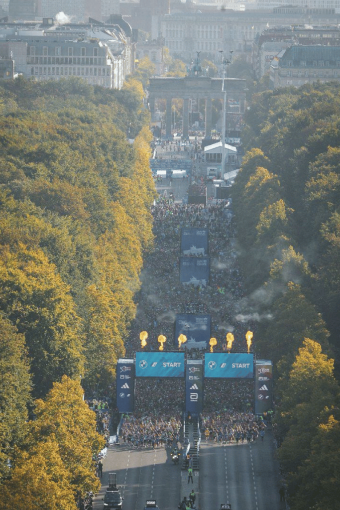 Gun and flares signal the start of the Berlin Marathon 2024