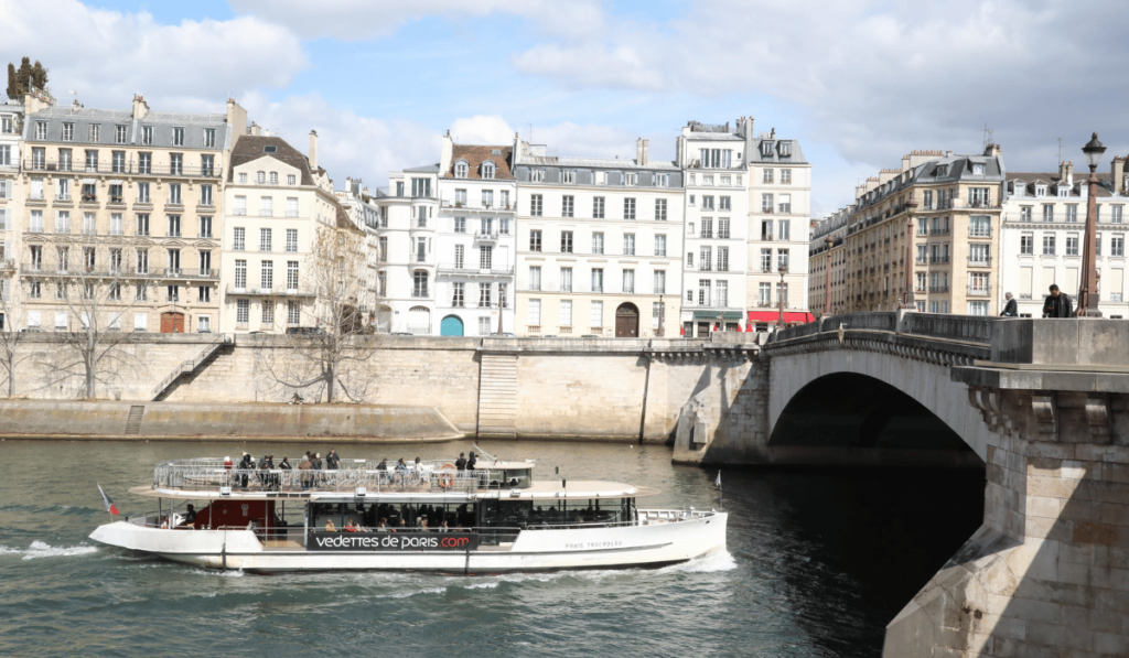 Bateau Mouche and View across the Seine from Ile de la CIte