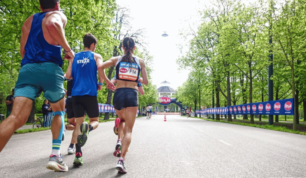 Runners on Hauptallee, part of Eliud Kipchoges course